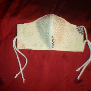 Beautiful embroidered ecru face mask